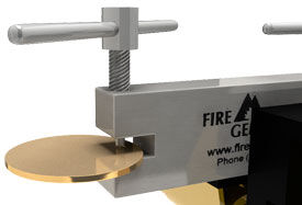 Metal blank positioned in hole punch tool